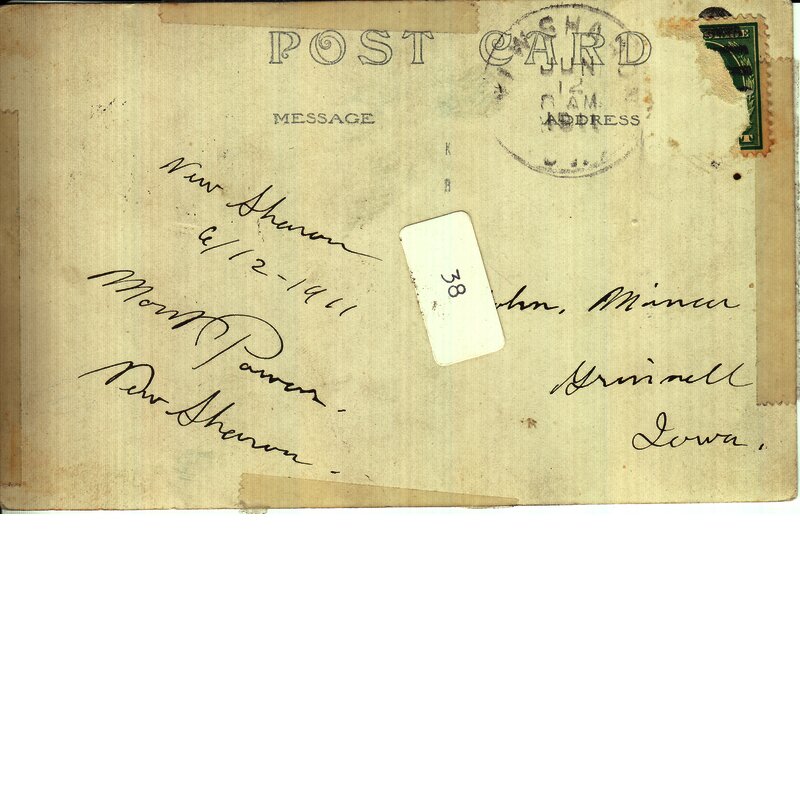  Postcard view of three early (1910s) automobiles, one a Ford and one an Oakland. The postcard was sent on June 12, 1911 from Mort(?) Powers of New Sharon, Iowa, to John Mincer of Grinnell, Iowa. The X under the automobile on the right probably identifies Mr. Powers. Photo was possibly taken in New Sharon. Drake Community Library (Grinnell, Iowa) Archives. McNally photographs. Collection #1, Series #1-1.
