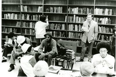 Wally Walker speaking to CBS students in the 20th century room. Members of CBS felt that many of the promised made to address CBS’s demands were not being fulfilled. To encourage more momentum, students staged a second demonstration. This time, students reshelved books that should be included in the Black Library and placed them in the 20th Century Room, which is where CBS wanted the Black Library to be located.