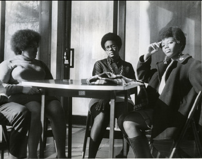 Three African American students sit in the Forum, March 1969. Left to right: Mattye L. Nelson ‘69, Karen M. Wooldridge ‘72, and L. Sherri DesChaps ‘69. All three were involved with CBS.