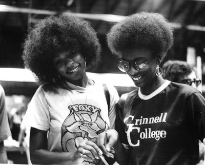 Two unidentified students smile during registration.The Black Manifesto’s stated that “We demand that this administration establish a Black community with no less that 200 representatives taken from all walks of life of Black people, and that the responsibility of for the establishment of this community be co-shared by the present black community.”