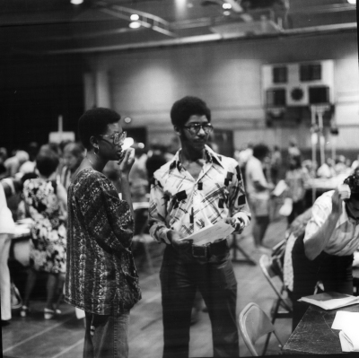 New Student Days 1975: Auditorium. The Black Manifesto’s stated that “We demand that this administration establish a Black community with no less that 200 representatives taken from all walks of life of Black people, and that the responsibility of for the establishment of this community be co-shared by the present black community.”
