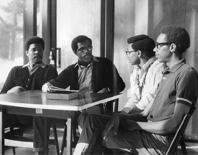 Booker T. Carter '71, Ernest T. Weston '71, Gregory M. Coggs '70, and Frank E. Thomas '71. were active in CBS. This photo, and other Black Expressions photos were in a brochure CBS created to let prospective Black students know what to expect from Grinnell College.