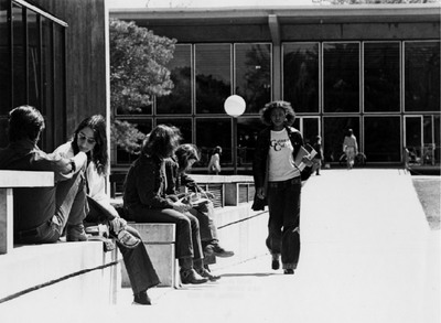 Outside of Burling Library and Forum with Barbara L. Critton '75. Critton was a member of CBS and attended Grinnell College during the takeover.